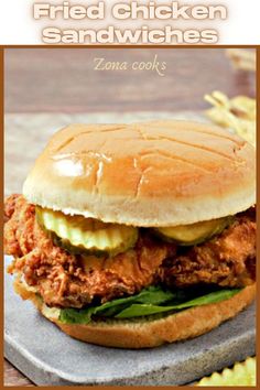 an easy crispy fried chicken sandwich with pickles on the side