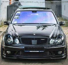 the front end of a black mercedes benz