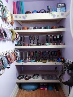 there are many pairs of shoes on the shelves