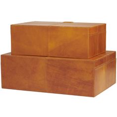 two brown leather boxes sitting on top of each other