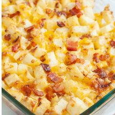 a casserole dish filled with potatoes and bacon