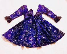 Girls Halloween dress, constellation dress, galaxy dress, zodiac sign dress, witch dress, boho dress, horoscope dress, ying yang, star dress Made of 100% cotton Fabric does not provide stretch Washing instructions: wash in cold water and air dry or dry on delicate Fitted Blue Star Print Dresses, Black Bohemian Dress For Halloween, Bohemian Long Sleeve Dress For Costume Party, Bohemian Halloween Festival Dresses, Fitted Witchy Dress For Festival, Witchy Dresses For Halloween Festival, Bohemian Halloween Party Dress, Witchy Halloween Festival Dress, Fitted Bohemian Dress For Costume Party