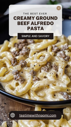 the best ever creamy ground beef alfredo pasta is served in a black bowl on a wooden table