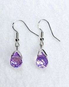 Handcrafted Lavender Faceted Crystal dangle drop earrings. They are the perfect earrings for any occasion. They pair well with any casual outfit and make a great gift for family and friends. Perfect for a bridesmaid gift or bride-to-be, or a birthday or anniversary gift for her. SHIPPING:  PROCESSING TIME IS CURRENTLY 1-2 DAYS FROM THE DATE OF PURCHASE. Processing time does not include shipping which is an extra 3-5 days. You will receive an email with tracking information once your order ships. Drop Jewelry, Crystal Teardrop Earrings, Jewelry Sterling Silver, Anniversary Gift For Her, Faceted Crystal, Gift For Family, Earring Backs, Bridesmaid Gift, Teardrop Earrings