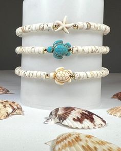 Listing is for ONE bracelet. Pic shown to reflect options. These are the perfect summer bracelet! Choice of White Howlite Turtle, Turquoise Howlite Turtle or Howlite Starfish. -White Turquoise Heishi Rondelle 6mm beads. -Turquoise Turtle, White Turtle and Starfish are all Howlite. -Accent Ball Beads- 14k Gold filled -Knot cover beads - 14k Gold plated -Quality stretch cord. Roll on wrist gently. -IMPORTANT Please see pictures for wrist measurement and sizing instructions. Add approximately .5 inch (half inch) to wrist size for snug comfortable fit. Not all bracelets measure the same. Please see measurements for each bracelet you order in the listings.  It is very important to accurately measure your wrist for proper fit as bracelets are non-returnable. -Be Safe. Small beads are a choking h Summer Bracelets Beads, Homemade Bracelets, Sea Turtle Bracelet, Jewelry Making Classes, Turtle Jewelry, Summer Bracelet, Sea Jewelry, Turtle Bracelet, Clay Bracelet