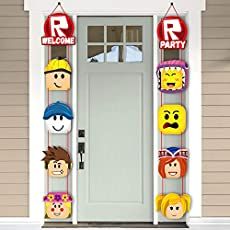 the front door is decorated with cartoon heads