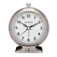 the westclox alarm clock is silver with black hands and numbers on both sides