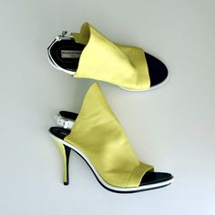 Balenciaga Leather Glove Slingback Sandals Mules In Yellow White! Description: Such A Rare Beauty By Balenciaga!!! Done In Gorgeous Leather, Love With Denim Or A Cute Mini:) Size: 38.5 (Us 8.5) Color: Yellow Condition: Like New. No Scratches Or Stains On Upper Leather. Without Original Box. Guaranteed Authentic Details: Almost Yellow Green Shade, Supple Leather, Fitted High Vamp, Open Toe, White Contrasting Trim, Black Rubber Insoles W/Leather & Fabric Designer Logo Patch, White Leather Slingback Adjustable Strap W/Silvertone Buckle, Approx. 4" Stiletto Heels, Leather Soles W/Logo. Minimal Wear On Soles. Minor Mark On Inner Left Shoe (Last Pic). Overall Gorgeous!!! Made In Italy Reta Yellow Open Heel Slingback Sandals, Yellow Open Toe Leather Slingback Sandals, Yellow Balenciaga Shoes, Yellow Slip-on Mules With Leather Sole, Yellow Leather Slip-on Heels, Balenciaga Leather, Logo Minimal, W Logo, Designer Logo