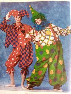 two clowns are standing next to each other wearing colorful outfits and hats with polka dots on them