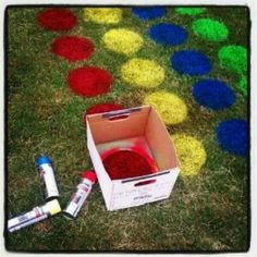 an open box with some paint on the ground