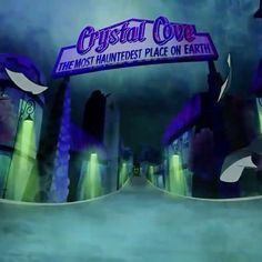 the entrance to crystal cove is lit up with purple and green lights in the background