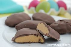 homemade reese's eggs on a white plate with the words homemade reese's eggs