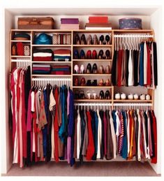 a closet filled with lots of clothes and shoes