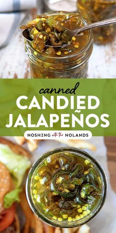 two jars filled with pickled jalapenos next to a sandwich on a table