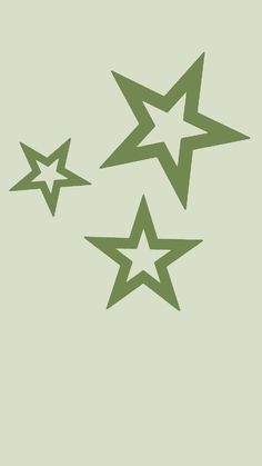 three green stars are flying in the air