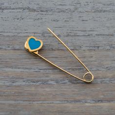 This is a safety pin brooch made of solid gold . The safety pin is 3.1cm(1.25 inches)long and weighs 0.6grams. Here is some details of the item: Gold-Glossy finish-Hand Made-Enamel-375 or 585 or 18K hallmarked Here is some informations about gold carat: Gold carat There are several carats available for gold. The carat is the gold content of the metal. The carat measures the proportion of pure gold mixed with other metal alloy to make up the final metal. The gold carats normally used in jewellery Gold Safety Pin Lapel Brooch, Gold Safety Pin Lapel Pin Gift, Gold Safety Pin Lapel Pin For Gift, Safety Pin Heart, Safety Pin Jewelry, Safety Pin Brooch, Gold Baby, Pin Jewelry, Baby Safety