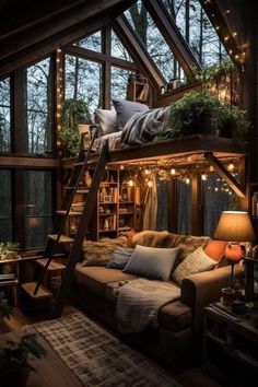 a loft bed with stairs and lights in the ceiling is lit up by string lights