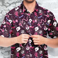 💀Work hard, party harder. Spider Web Short Sleeve Button-Down Shirt features Exclusive, original artwork by NeoSkull. Each item is individually printed, cut, and sewn to ensure a flawless graphic with no imperfections. A great addition to Your alternative clothing wardrobe. Stay cool with this fun printed short-sleeve button-down shirt. It comes in regular width and spread collar. Perfect for those dressier hot days. Always up-to-date skull Decor Goth Clothing. * Fabric: 100% Polyester Poplin * Crowlines Shirt, Fun Collared Shirts, Cool Button Up Shirts, Colorful Goth Outfits, Colorful Goth, Button Down Style, Clothing Wardrobe, Goth Shirt