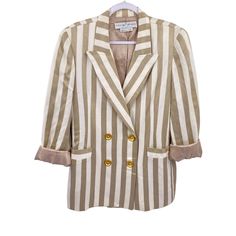 Features: * Vintage Lillie Rubin blazer * Size tag is unreadable, please review measurements * Measures like a Medium to Large * Off white and tan stripes * Brushed gold buttons * Blazer * Satin lined * Pockets * Double breasted * Great preppy academia fall look Size: Womens L Measurements: Across bust 20.5 in / 52 cm Length 28 in / 71 cm Sleeve (unrolled) 23.5 in / 60 cm Across Back 16 in / 41 cm Condition: Pre-Owned Good Good vintage condition Chic Striped Double-breasted Blazer, Fall Striped Double-breasted Blazer, Spring Striped Button-up Blazer, Striped Formal Blazer With Button Closure, Formal Striped Blazer With Button Closure, Vintage Striped Workwear Blazer, Vintage Striped Blazer For Work, Vintage Striped Blazer For Workwear, Preppy Vintage