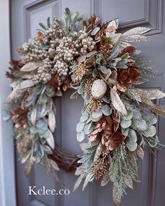 a wreath is hanging on the front door