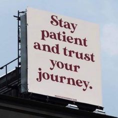 a sign that says stay patient and trust your journey