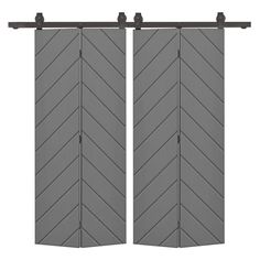 two gray shutters with black handles on each side and an arrow design in the middle