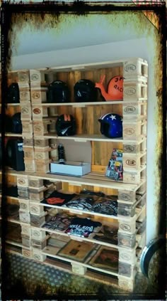 a wooden shelf filled with lots of different items