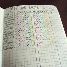 the daily task tracker is shown in an open notebook