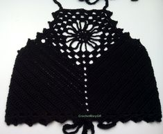 Handmade beautiful black crochet top, summer cropped halter tank top YARN 100% mercerized cotton. SIZES: Available in three sizes ..  Small  - Medium - Large - XL Model wears size .. Small Washing the knitted good is done by hand and spread flat. Colors may vary due to screen difference. Black Crochet Top For Summer Festival, Black Crochet Lace Tops For Vacation, Black Crochet Lace Top For Summer, Black Bohemian Crochet Top With Crochet Trim, Fitted Black Crochet Top For Summer, Black Fitted Crochet Top For Summer, Black Bohemian Top With Crochet Trim, Black Crochet Lace Tops For Summer, Black Fitted Bohemian Crochet Top