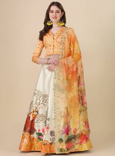 Make a statement in this gorgeous yellow satin lehenga set featuring a circular lehenga with digital prints, an unstitched blouse and multicolor organza dupatta with beautiful embroidered sequence work. The contrasting dupatta complements the lehenga perfectly. Style it for your next wedding or festival to look absolutely fabulous! This complete ensemble is sure to make you feel like the diva you are! #yellowlehenga #yellowlehengas #yellowlehengacholi #yellowlehengadress #yellowlehengadesigns #yellowlehengadesign #yellowcolorlehenga #designeryellowlehenga Yellow Satin, Sequence Work, Organza Dupatta, Absolutely Fabulous, Lehenga Choli, Lehenga