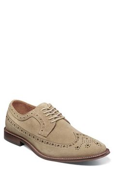 Anatomical arch support ensures lasting comfort in a refined derby with wingtip accents for a defined look. Removable, cushioned insole with arch support Leather upper/synthetic and textile lining/rubber sole Imported Fitted Wingtip Dress Shoes With Removable Insole, Classic Wingtip Dress Shoes With Ortholite Insole, Fitted Suede Wingtip Oxfords, Classic Beige Wingtip Oxfords, Wingtip Oxfords With Ortholite Insole, Classic Wingtip Lace-up Shoes With Removable Insole, Classic Beige Wingtip Dress Shoes, Suede Wingtip Oxfords With Cushioned Footbed, Casual Semi-formal Wingtip Lace-up Shoes