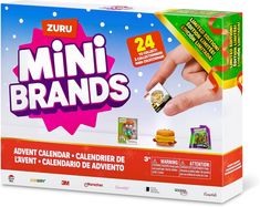 an advertisement for the zuzu mini brands calendar, with hand holding a small item