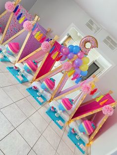 a room filled with lots of balloons and decorations