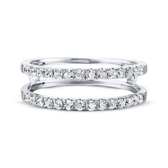 two white gold wedding bands with round diamonds on each band, set in 18k white gold