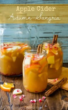 two mason jars filled with apples and cinnamon