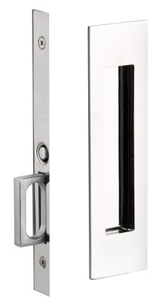 an open door with a handle on the front and back doors, both in stainless steel