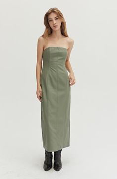 Designed to elevate your day-to-night wardrobe with its paneling seam detail that flatters every body type. Strapless Paneled design Back invisible zipper Back center slit Bodycon fit Midi length Fully lined 50% Rayon, 50% PU Hand wash, Line dry Imported Leather Tube Dress, Valentina Dress, Taylor Swift Dress, Tube Midi Dress, Maxi Jumpsuit, Green Midi Dress, Dresses By Length, Tube Dress, Casual Sets