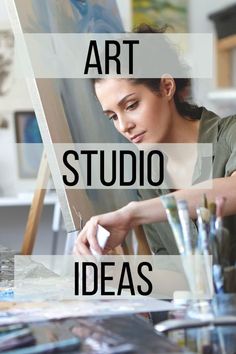 a woman sitting at a easel painting with the words art studio ideas