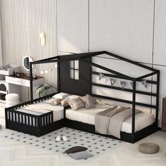 a black and white bedroom with a day bed