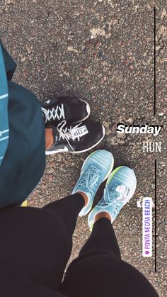 two people standing next to each other in front of a sign that says sunday run