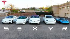 three electric cars parked in a parking lot with the words xyr written on them