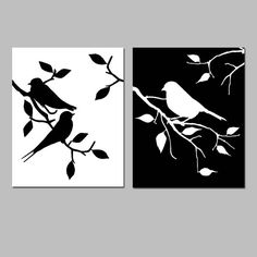 two black and white prints with birds perched on tree branches, one in the foreground