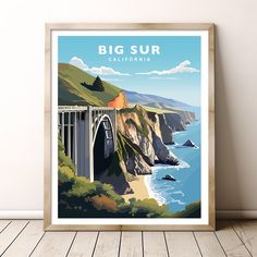 the big sur california poster is hanging on a wall