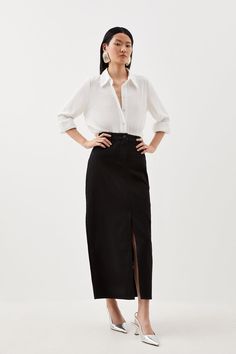 Reminiscent Of '90S Style, Yet Undeniably Fashion-Forward, This Denim Maxi Skirt Is A Wardrobe Essential For This Season And Next. Crafted With Light Wash Denim, This Piece Naturally Exudes An Off-Duty Mood. Elevate This Skirt With Heels And A Blouse For A Day-To-Evening Look, Or Pair With Trainers And A T-Shirt For An Effortless Everyday Outfit.Light Wash Denimfront Leg Slitfront And Back Pocketsbelt Loopsmaxi Hemline White Blouse Black Skirt Outfit, Black Midi Skirt Outfit Work, Black Maxi Skirt Outfit For Work, Maxi Pencil Skirt Outfit, Black Denim Maxi Skirt Outfit, Work Outfit Skirt, Black Skirt White Top, Blouse Skirt Outfit, Denim Maxi Skirt Outfit