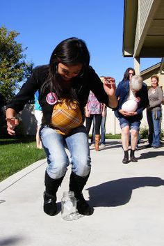 a group of people walking down a sidewalk