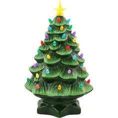 a green ceramic christmas tree with lights on it