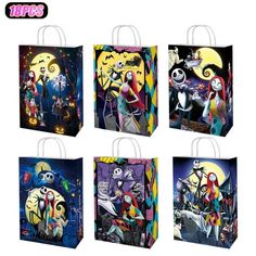 four bags with cartoon characters on them in different colors and sizes, all decorated to look like halloween