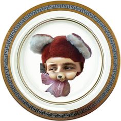 a plate with a photo of a man's face in a hat on it