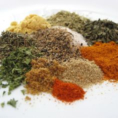 various spices are arranged on a plate to be used as an appetizer or side dish