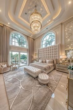 a luxurious bedroom with large windows and chandelier